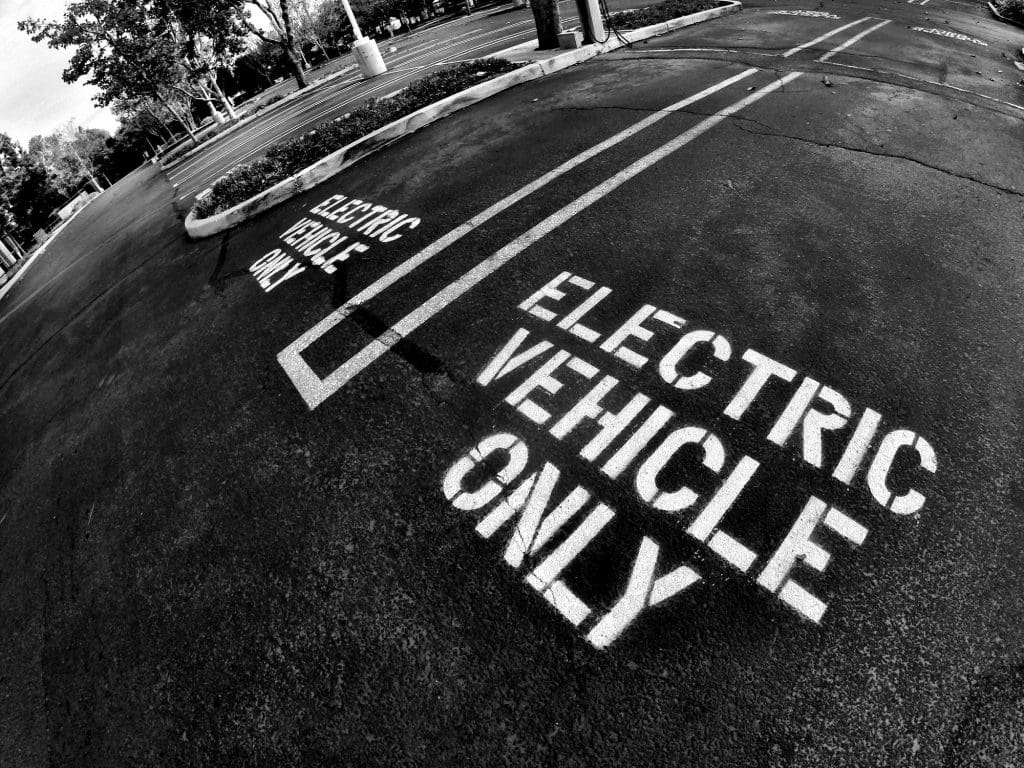 black and white photo of an electric vehicle only sign, EV terms explained