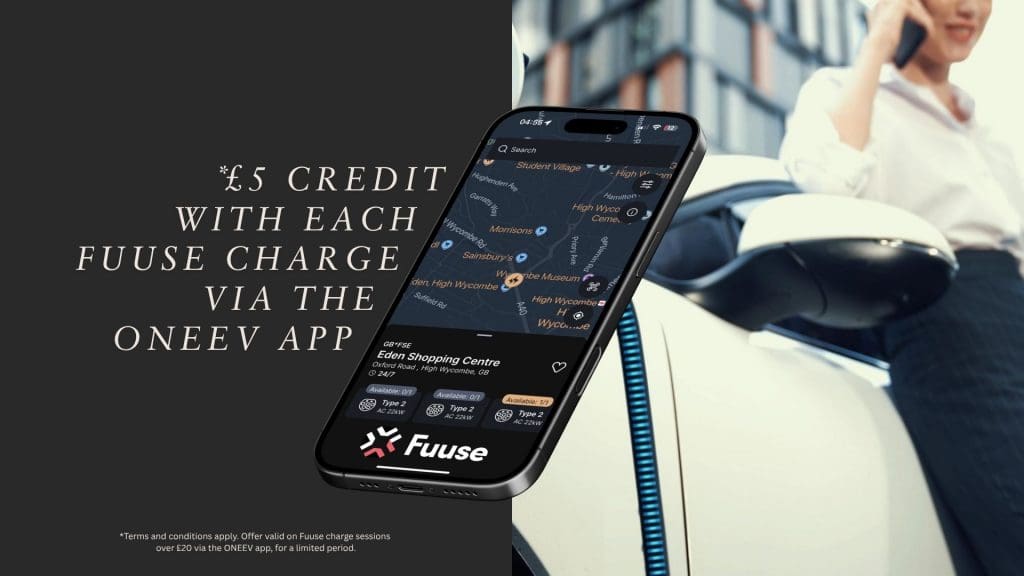 woman sitting in a car talking on a cell phone with fuuse charging £5 credit