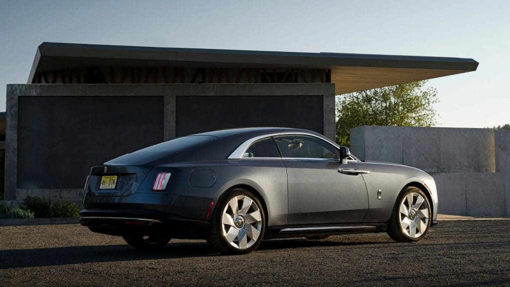 silver rolls royce parked in front of a house, one of the best electric cars 2025