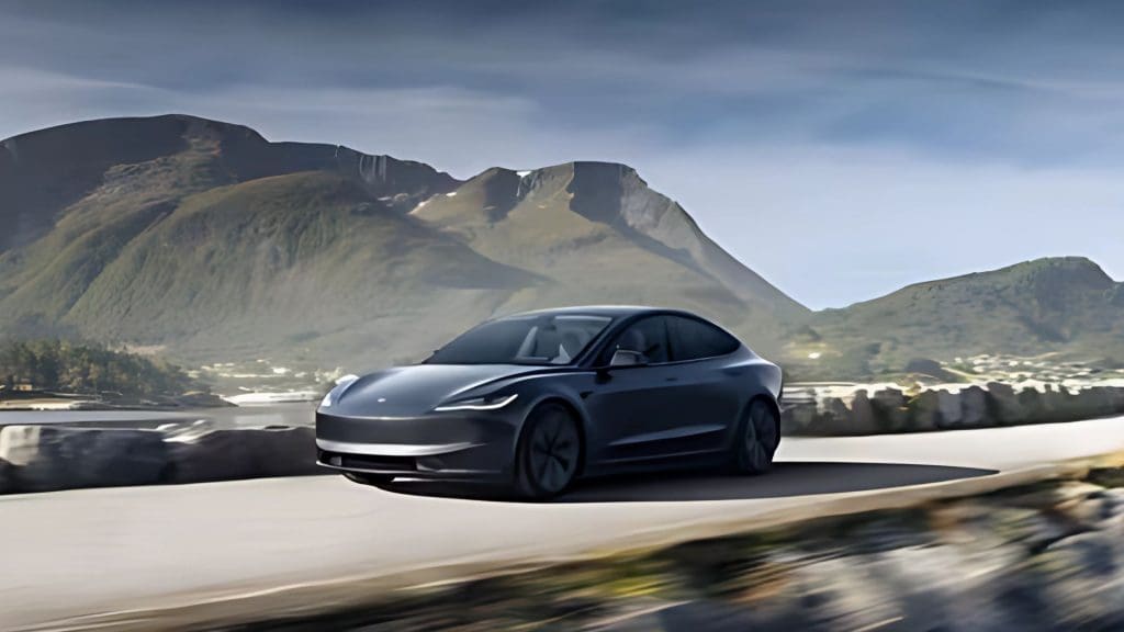 car driving down a road with mountains in the background, showcasing one of the best electric cars of 2025